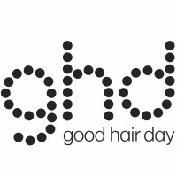 a logo for a hair salon with dots on it